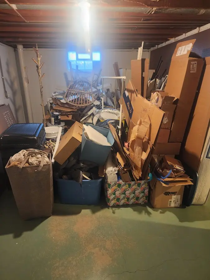 Roll-off dumpster container at job site for Yard Waste Dumpster Rental in Unicoi